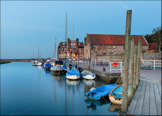 103327247 Boats on the quay at Blakeney on the north coast of Norfolk, available in multiple sizes