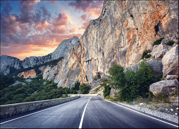 148465043 asphalt road landscape with high rocks mountain road and amazing cloudy sky at sunset, available in multiple sizes