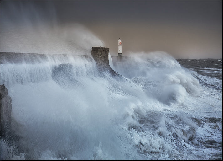 210348802 lighthouse as Storm Brian lands on the Porthcawl coast of South Wales UK, available in multiple sizes