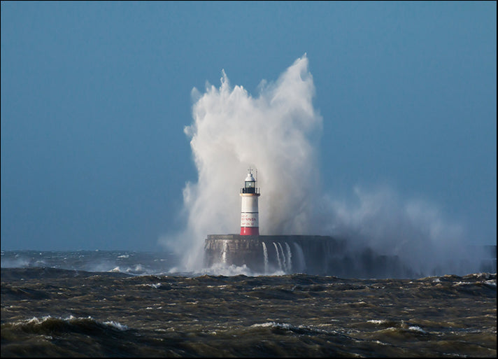 222413008 Breaking wave over Newhaven Lighthouse in East Sussex, available in multiple sizes